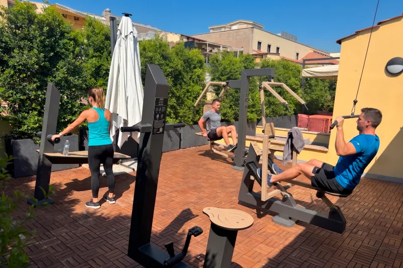 Outdoor hotel fitness area with workout equipment and wellness facilities, exclusive terrace in central Rome near Termini - Hotel Milani, BZAR hotels in Rome